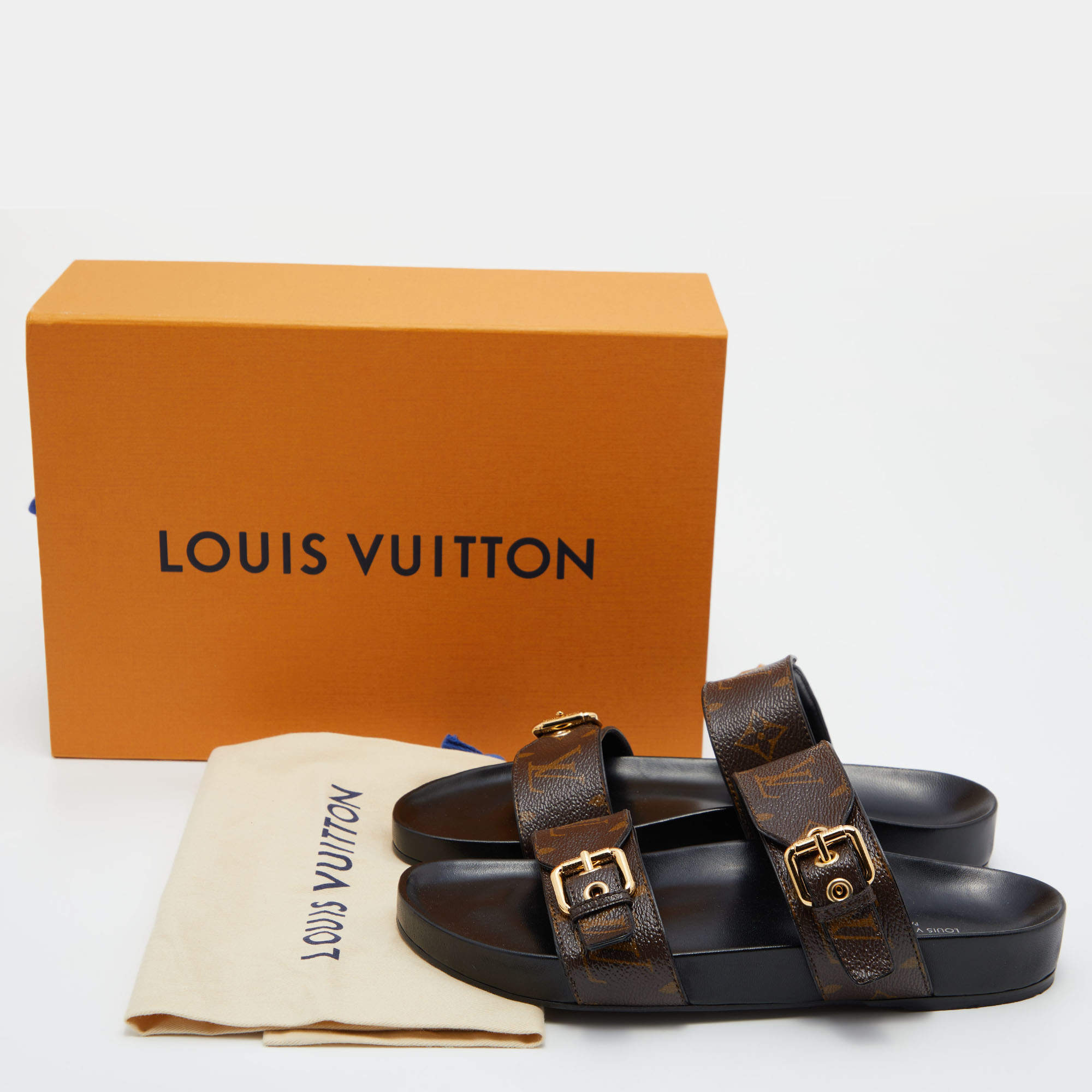 Louis Vuitton Brown Monogram Coated Canvas Bom Dia Flat Slides Size 39 -  ShopStyle