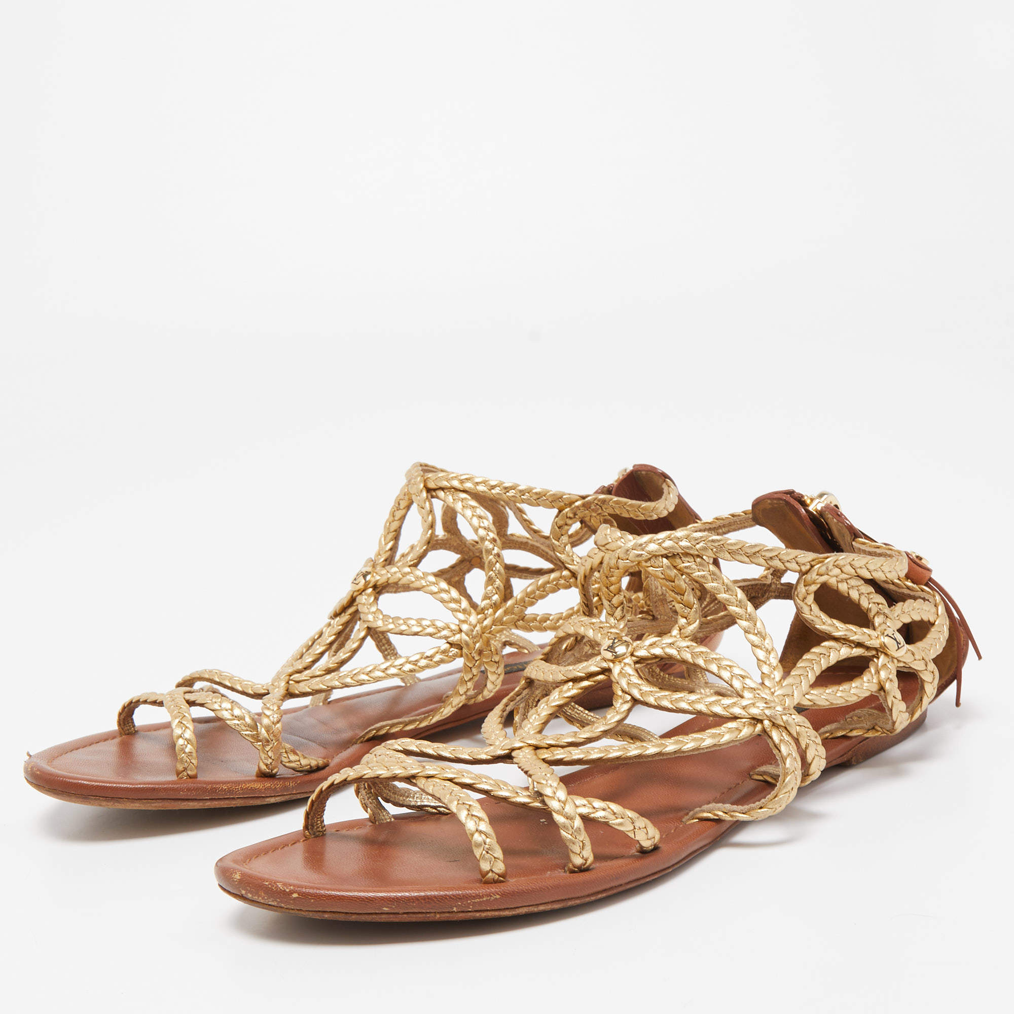 Louis Vuitton Gold Braided Leather Strappy Flat Sandals Size 37 - ShopStyle