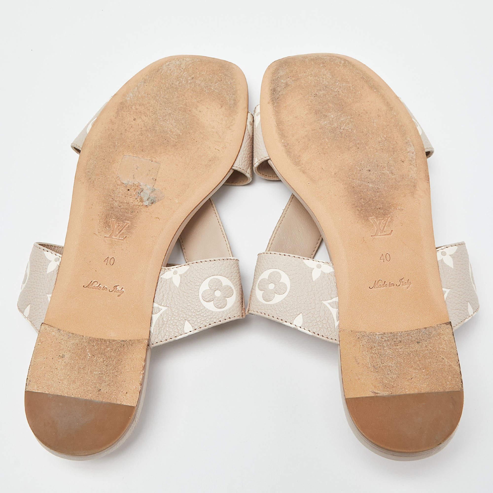 Louis Vuitton Beige/White Monogram Embossed Leather Flat Slides Size 40  Louis Vuitton | The Luxury Closet