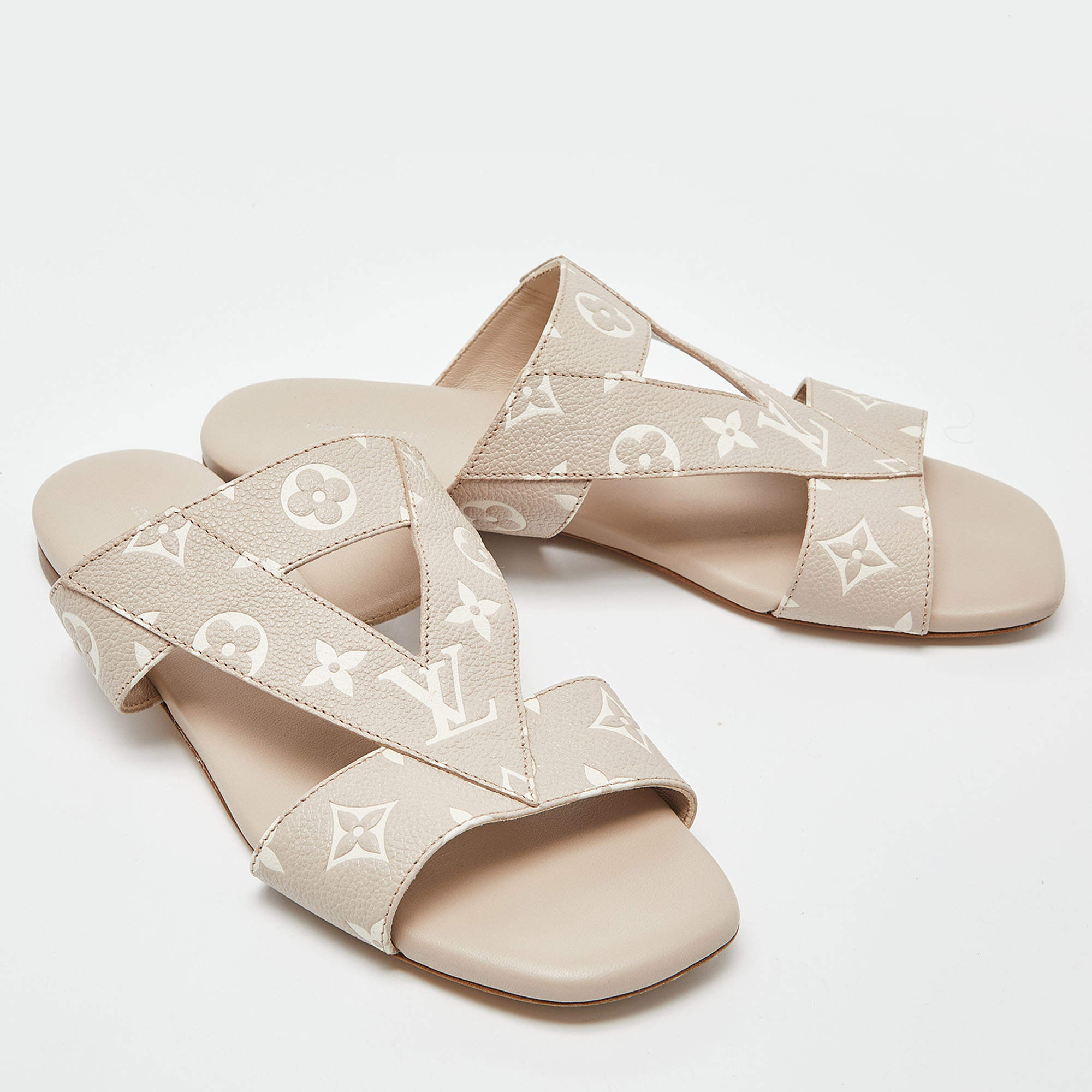 LOUIS VUITTON Calfskin Monogram Embossed Bom Dia Flat Mule Sandals