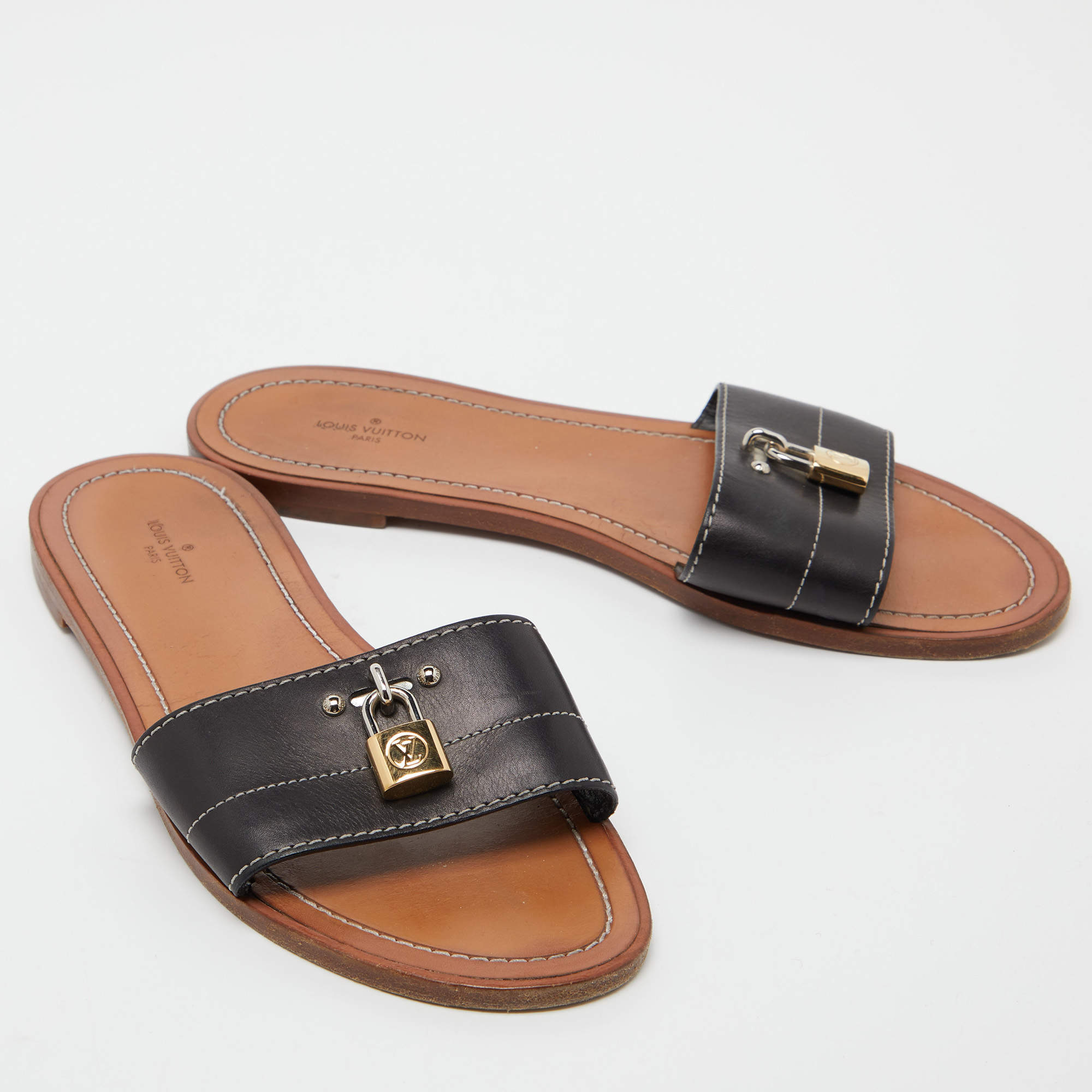 Louis Vuitton Black Leather Lock It Flat Slides Size 38 Louis