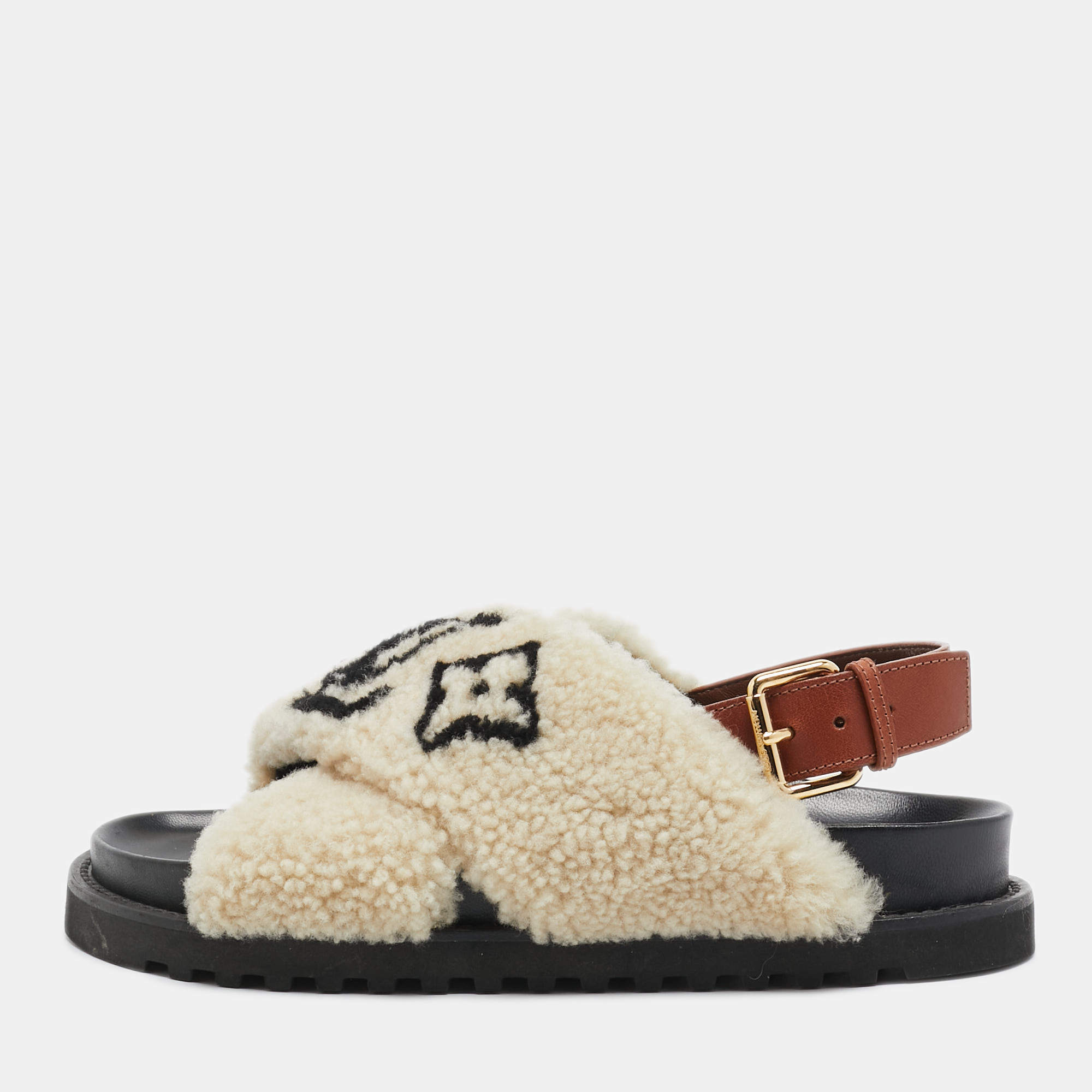 مملوكة مسبقًا Louis Vuitton White/Brown Fur and Leather Slingback Flat Sandals Size 39