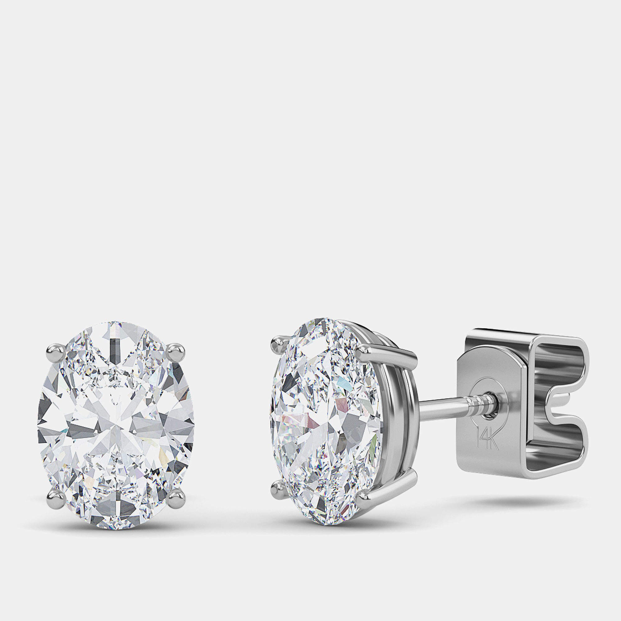 14K Oval Cut Solitaire Lab Grown Diamonds Earrings (3/4 Ctw)