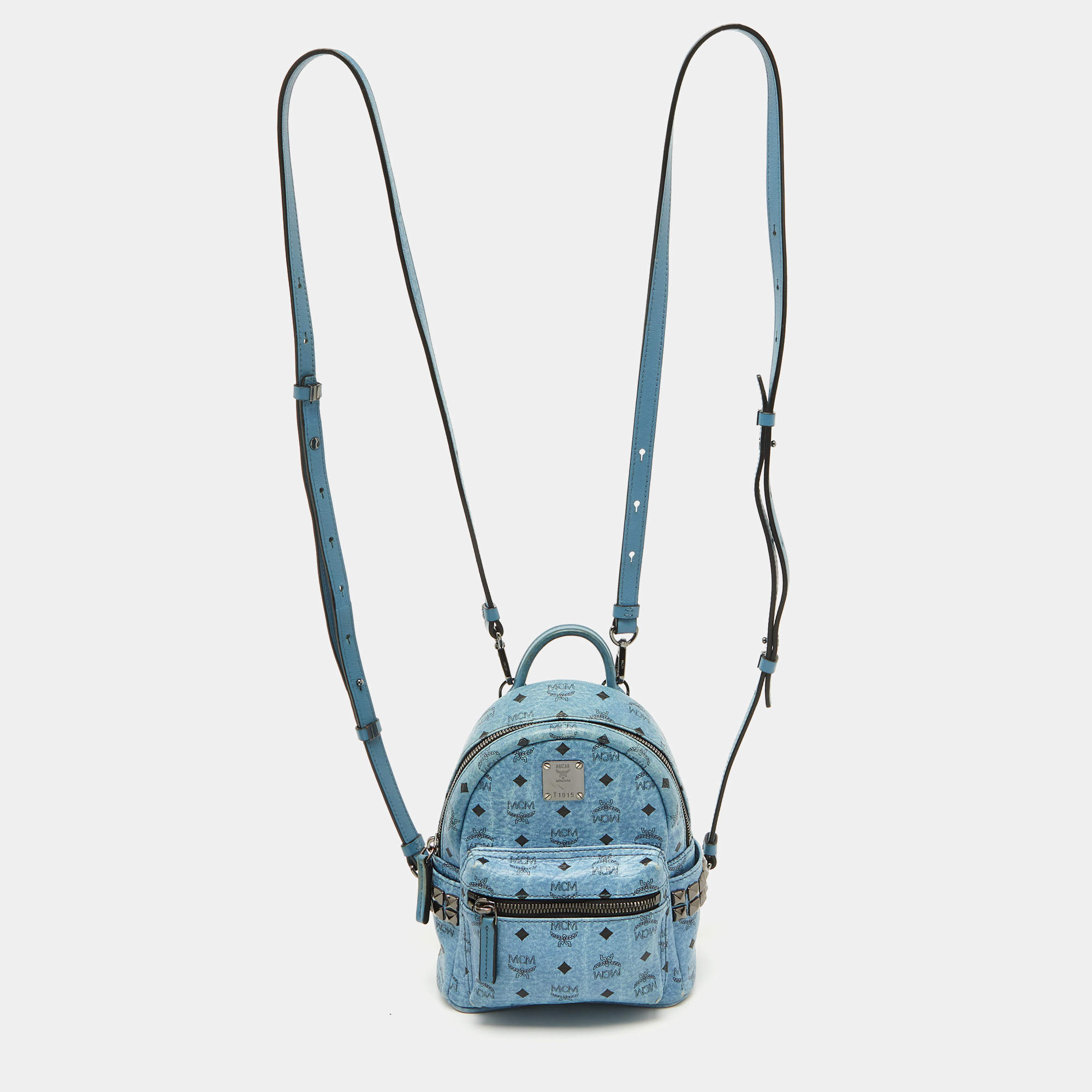 MCM Blue Visetos Coated Canvas and Leather Side Stud X-Mini Stark Bebe Boo Backpack