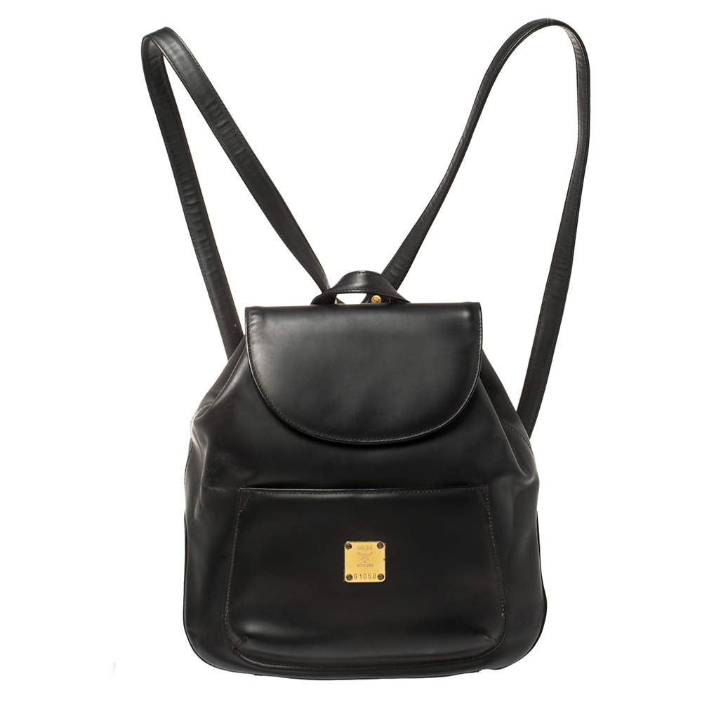 leather flap backpack