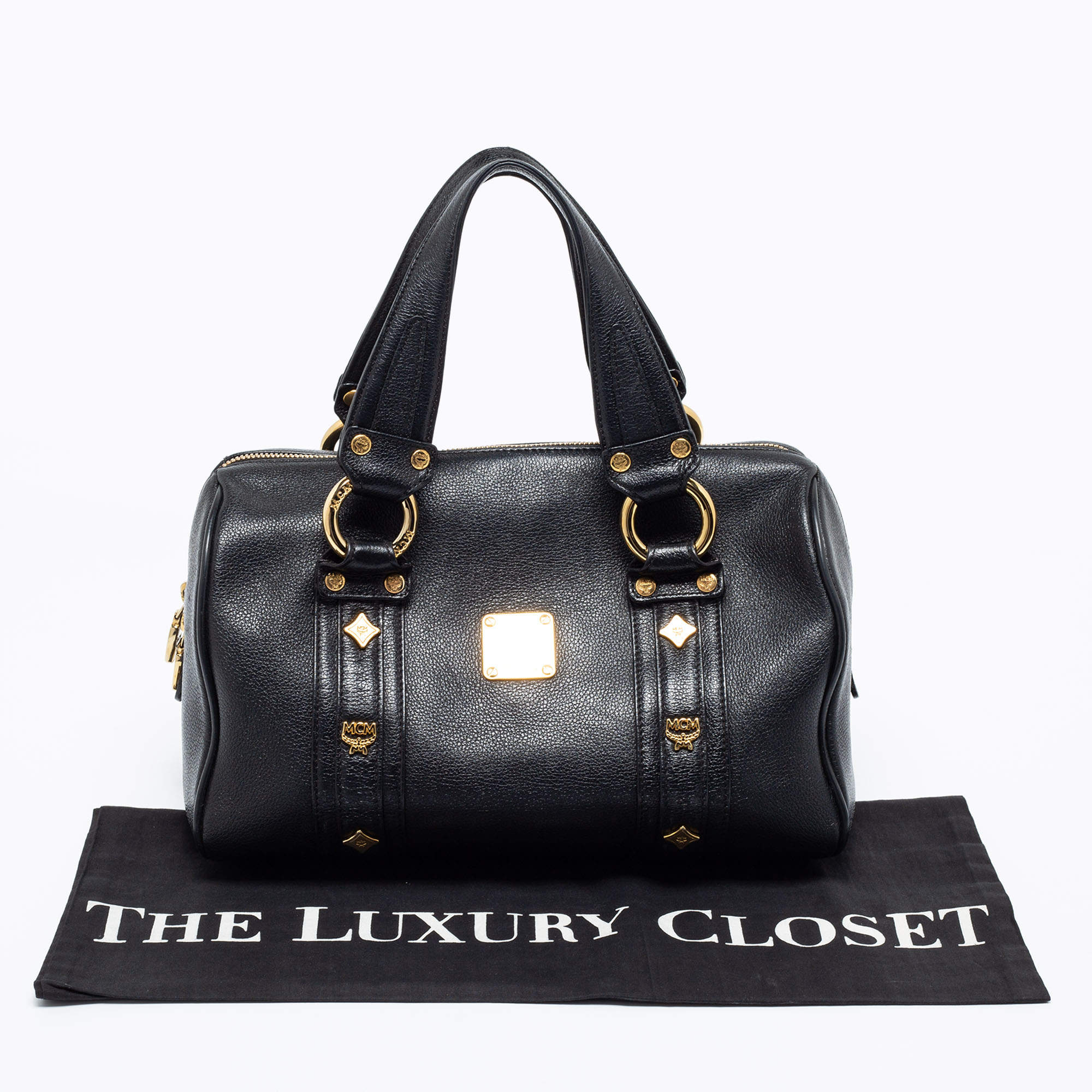 MCM shoulder bag black gold metal fittings leather used clutch bag