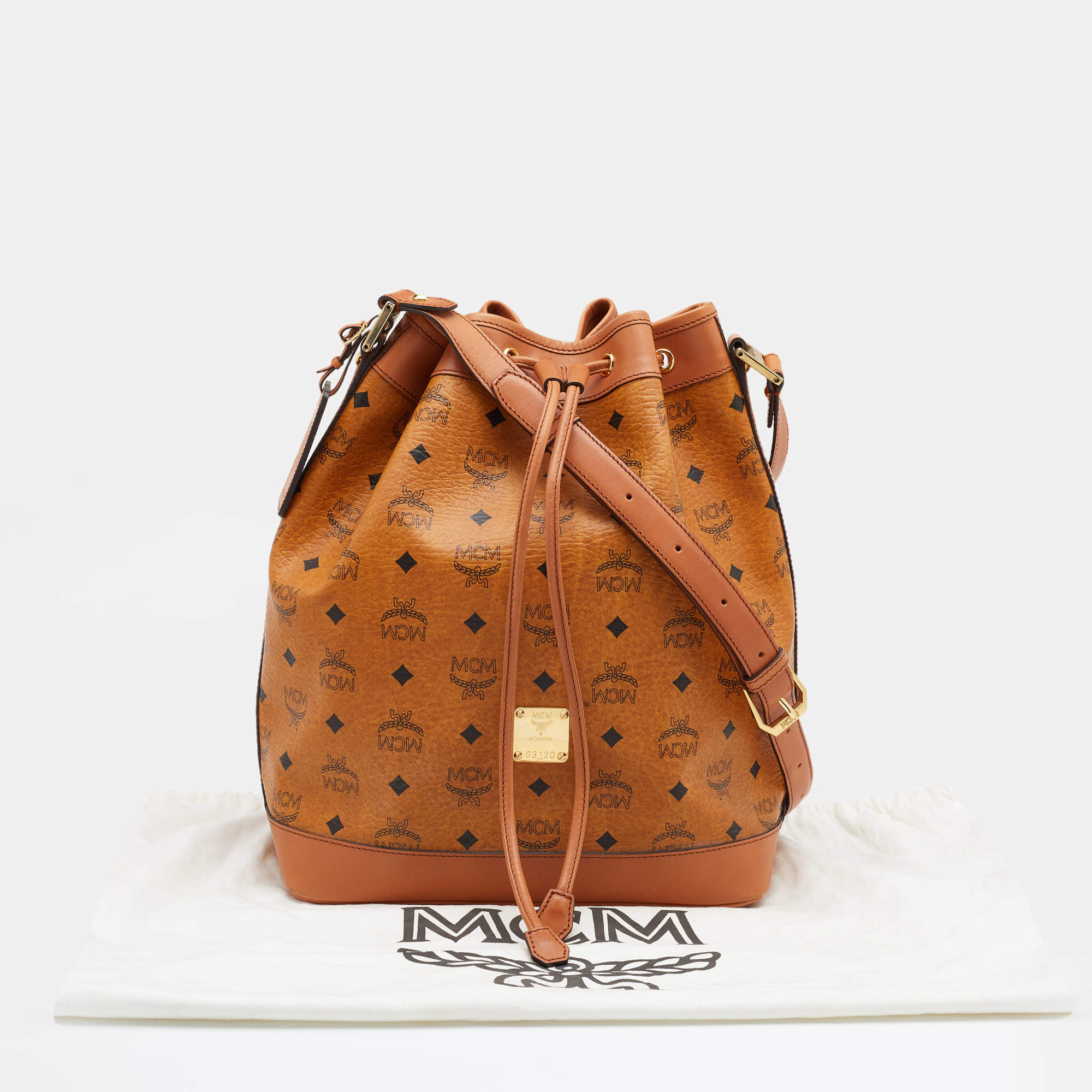 MCM Visetos Leather Drawstring Bucket Bag (SHG-28152) – LuxeDH