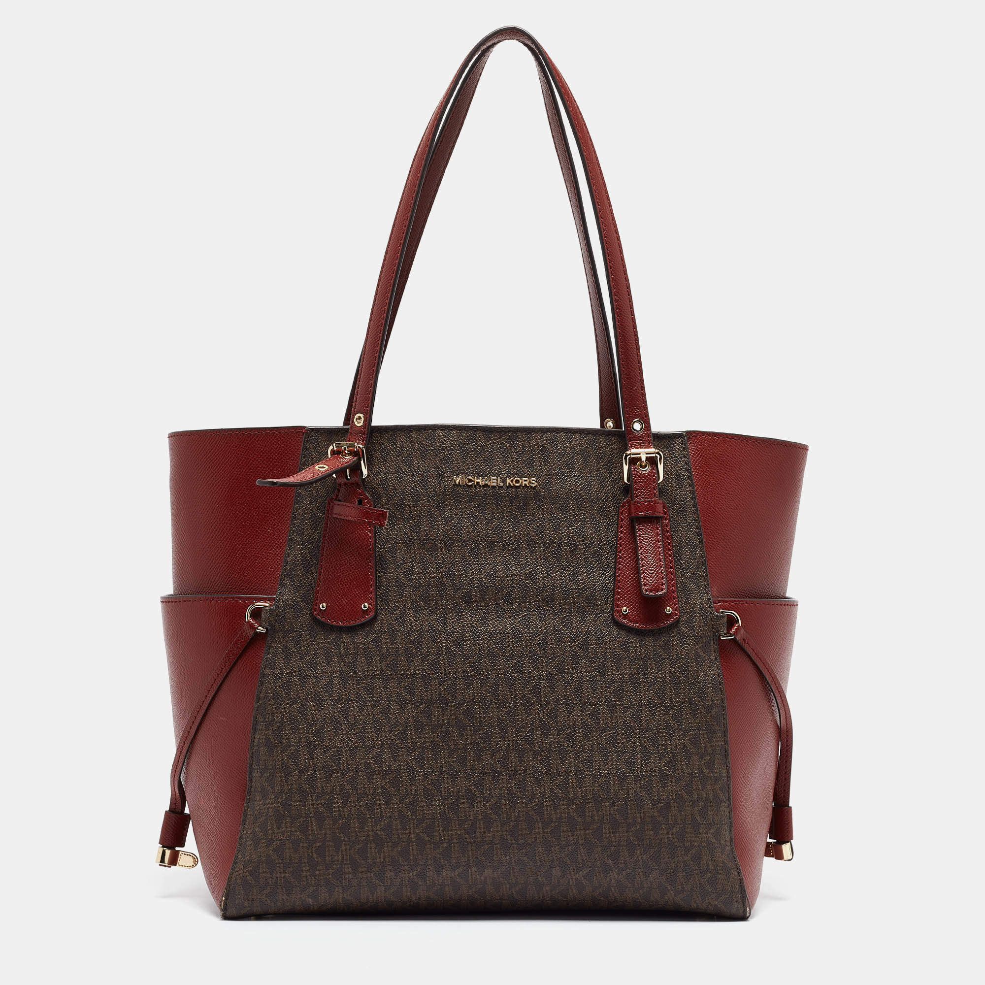 Pre Owned Michael Kors Red/Brown Signature Coated Canvas and Leather Voyager East West Tote