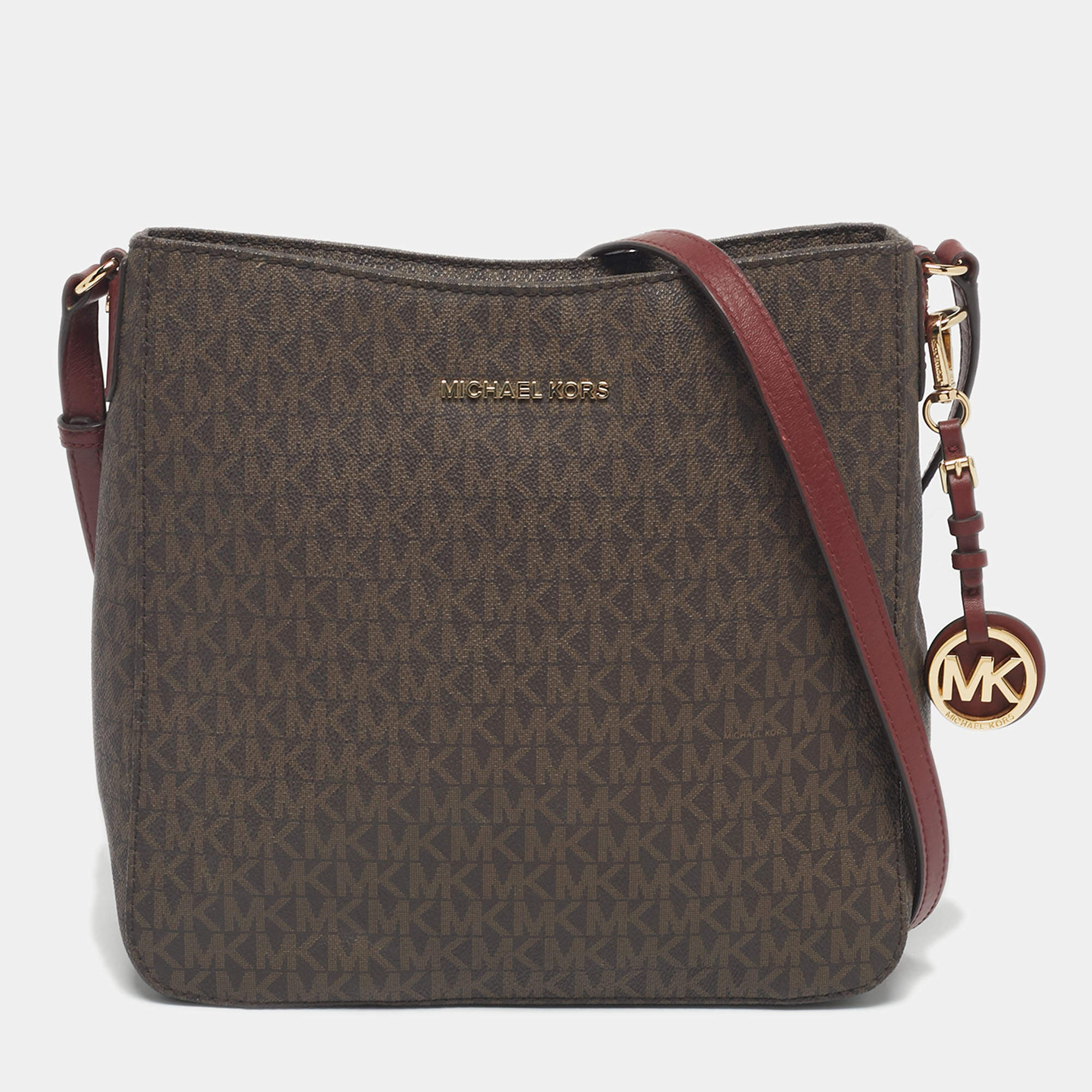 Pre Owned Michael Kors Burgundy/Brown Signature Coated Canvas and Leather Jet Set Travel Messenger Bag