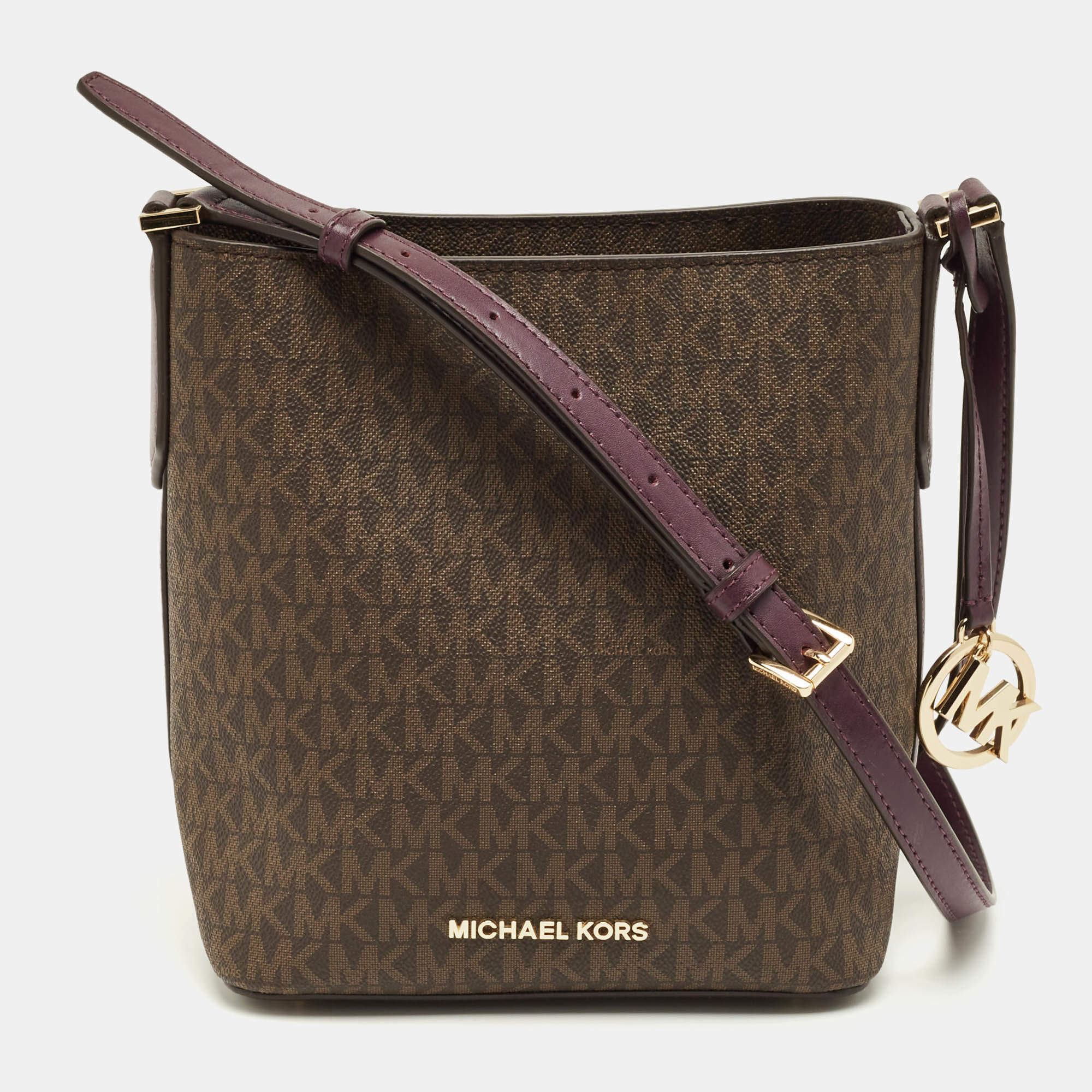 Pre Owned Michael Kors Purple/Brown Signature Coated Canvas and Leather Bucket Bag