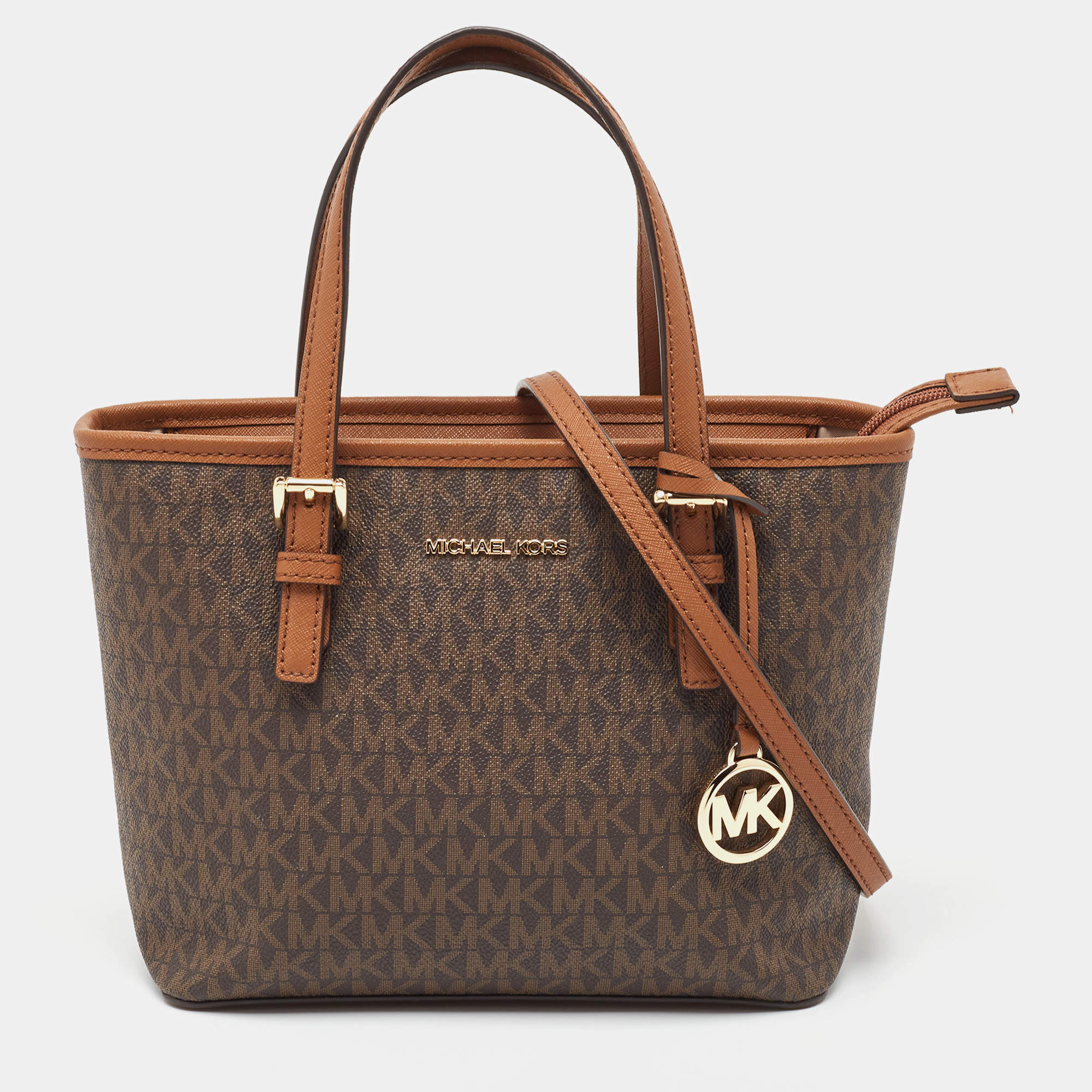 Pre Owned Michael Kors Brown Signature Coated Canvas and Leather Jet Set Carryall Tote
