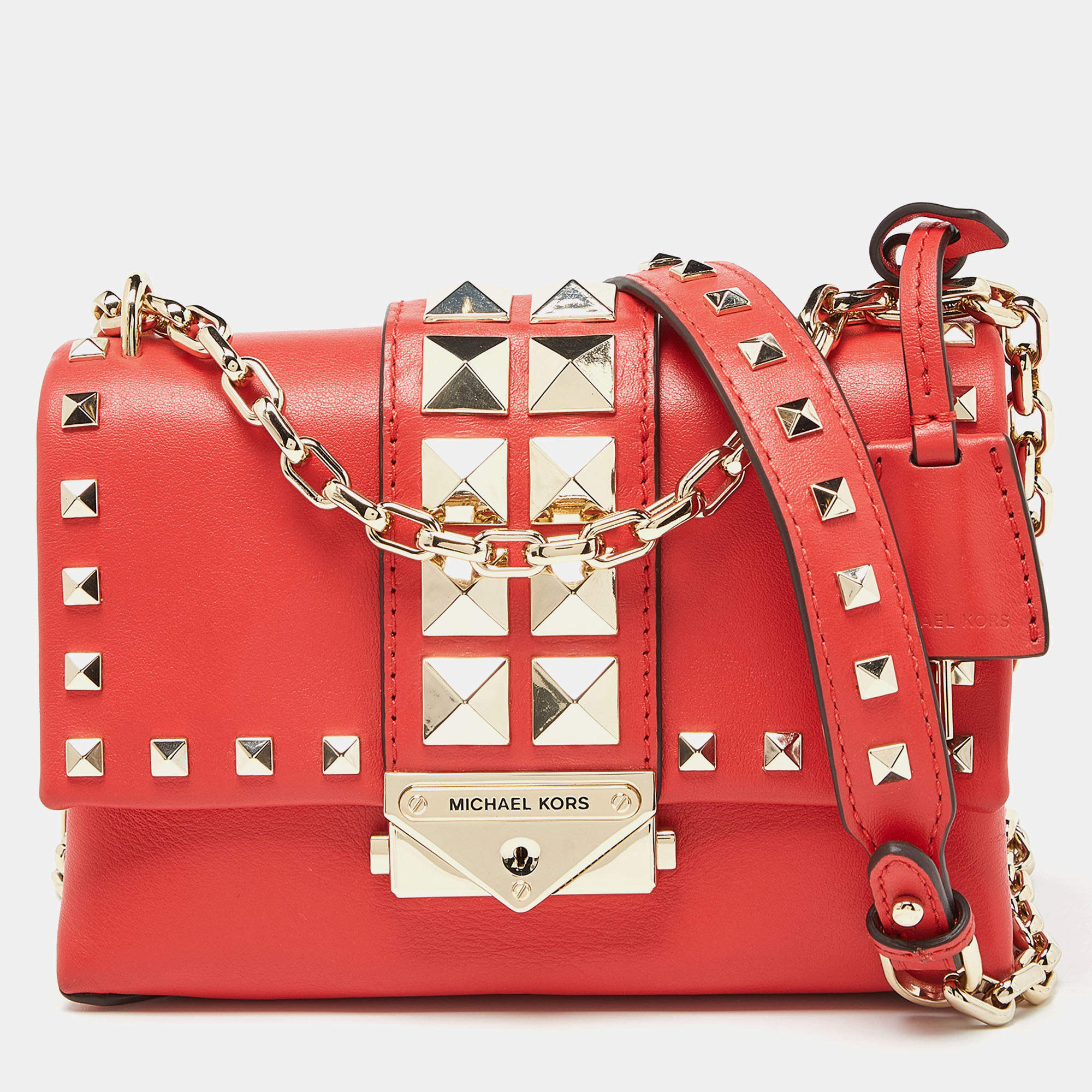 Red Michael Kors bag with popular studs