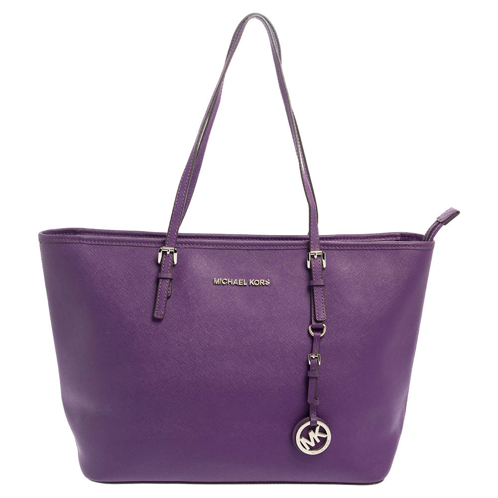 مملوكة مسبقًا حقيبة يد توتس مايكل كورس ترافيل جيت سيت جلد بنفسجي كبيرة
