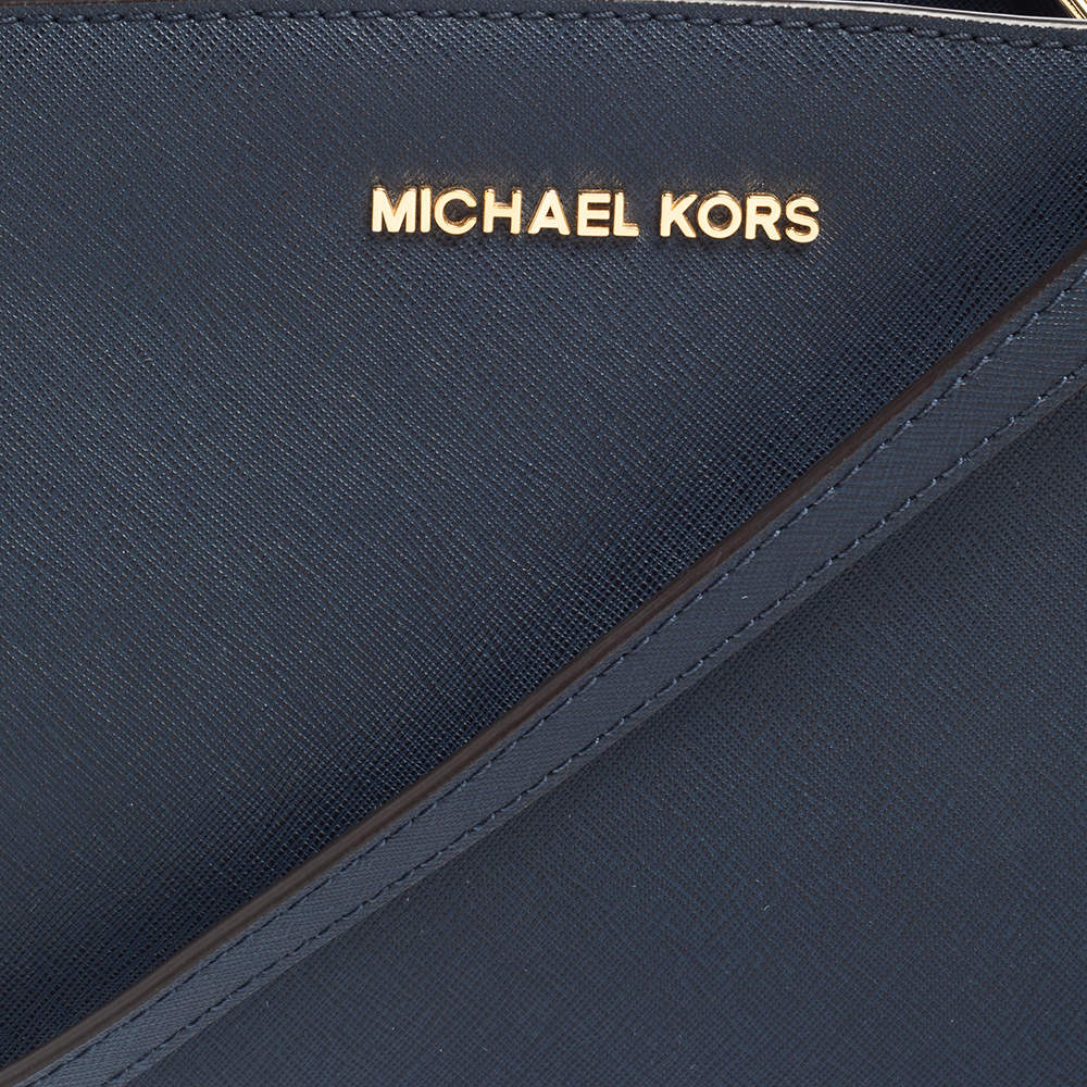 Leather clutch bag Michael Kors Navy in Leather - 31159724