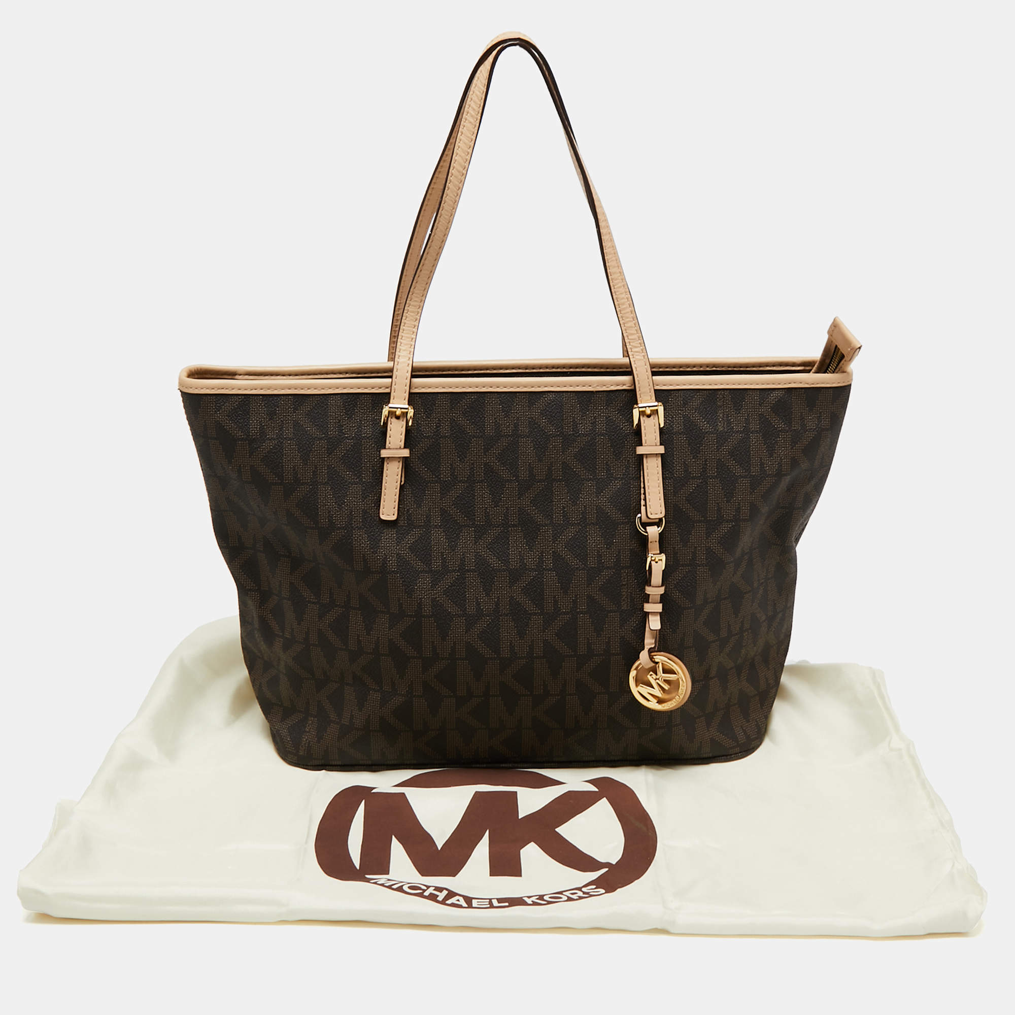 Guaranteed Original Michael Kors Jet Set Travel in Signature