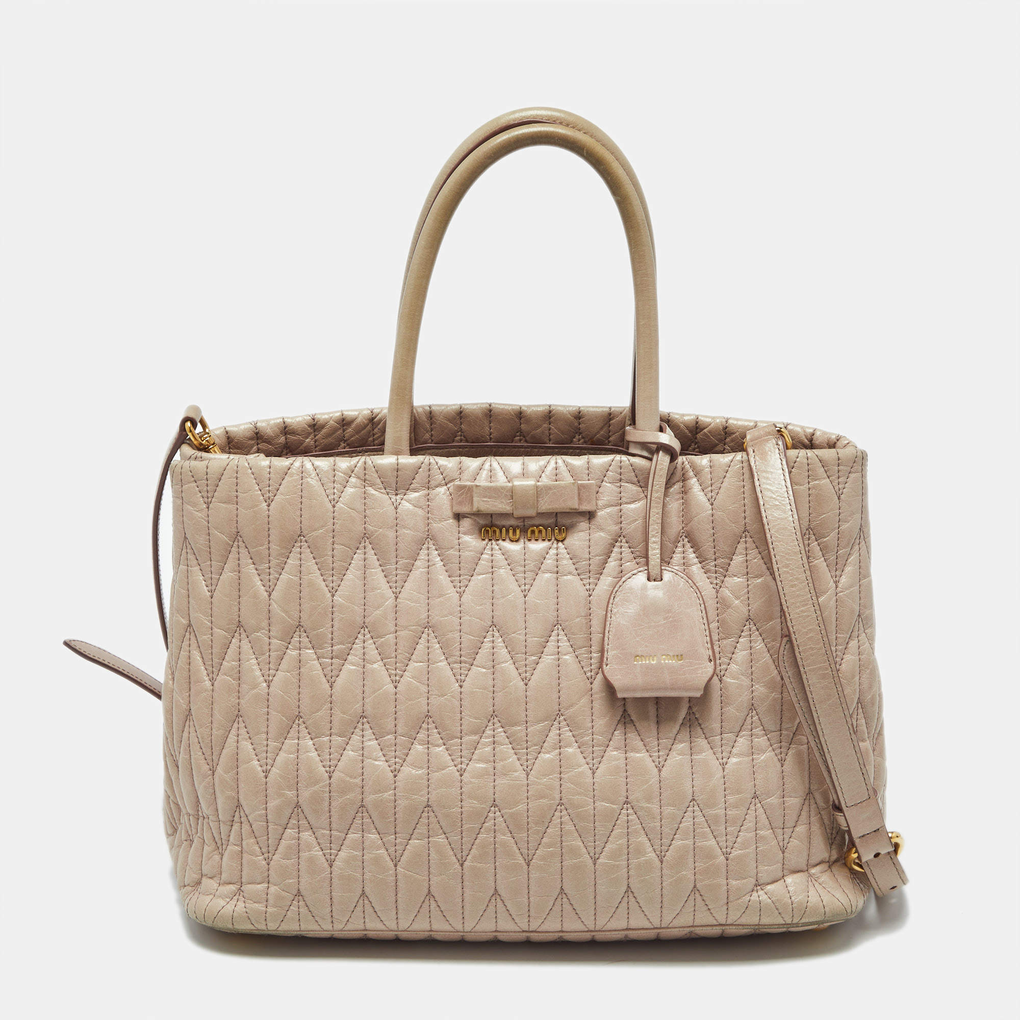 Pre Owned Miu Miu Light Pink Matelasse Leather Bow Tote