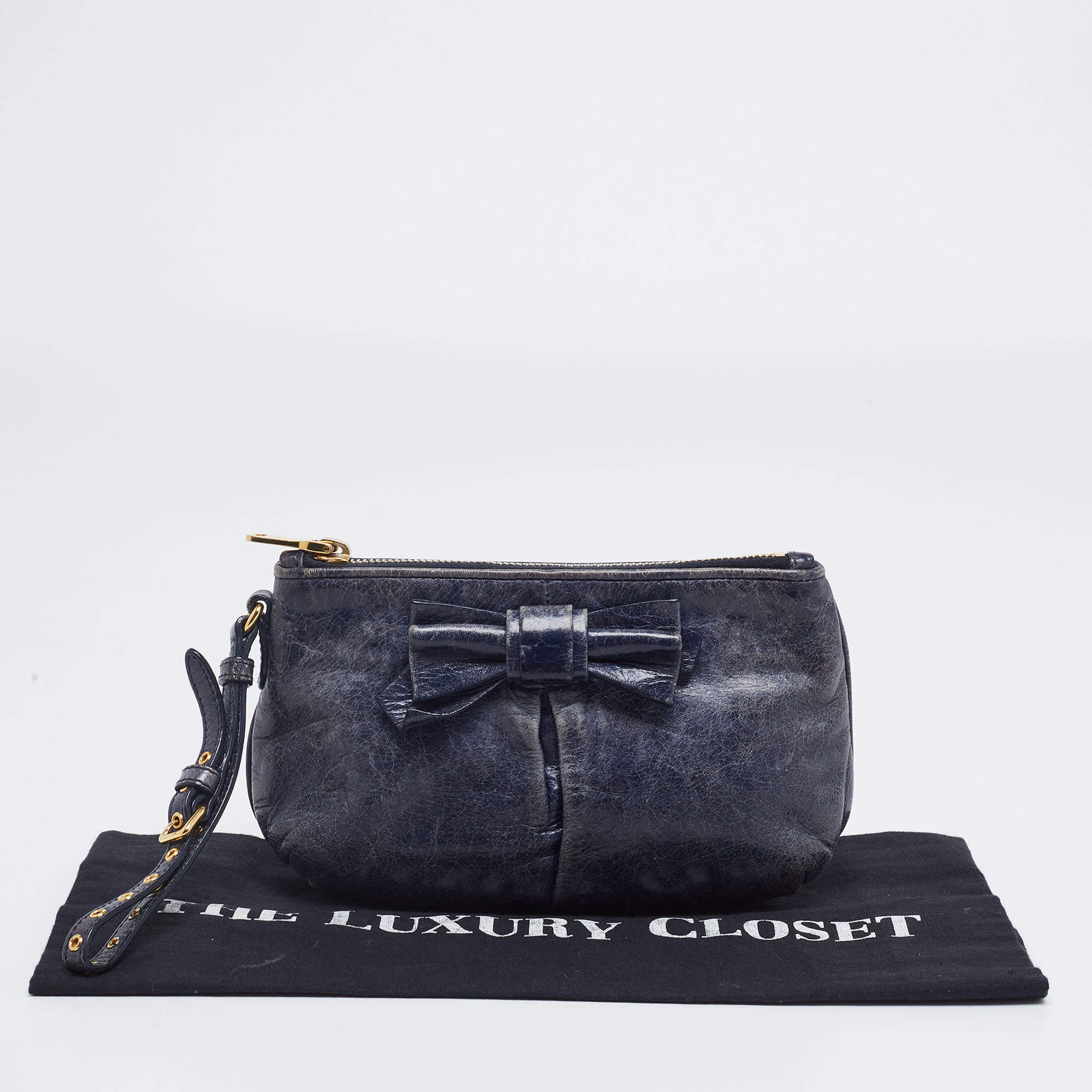 Pre Owned Miu Miu Navy Blue Leather Bow Wristlet Clutch