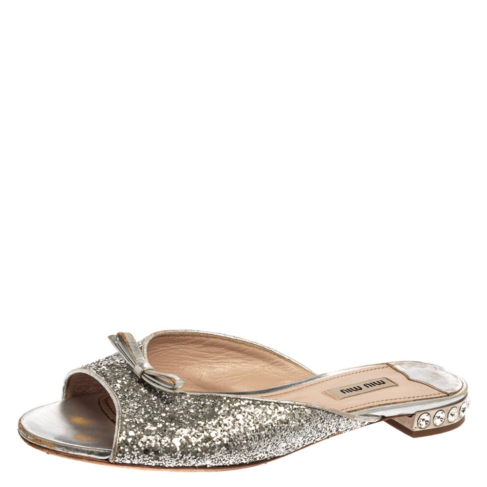 Pre Owned Miu Miu Metallic Silver Glitter Bow Detail Crystal Embellished Flat Slides Size 39