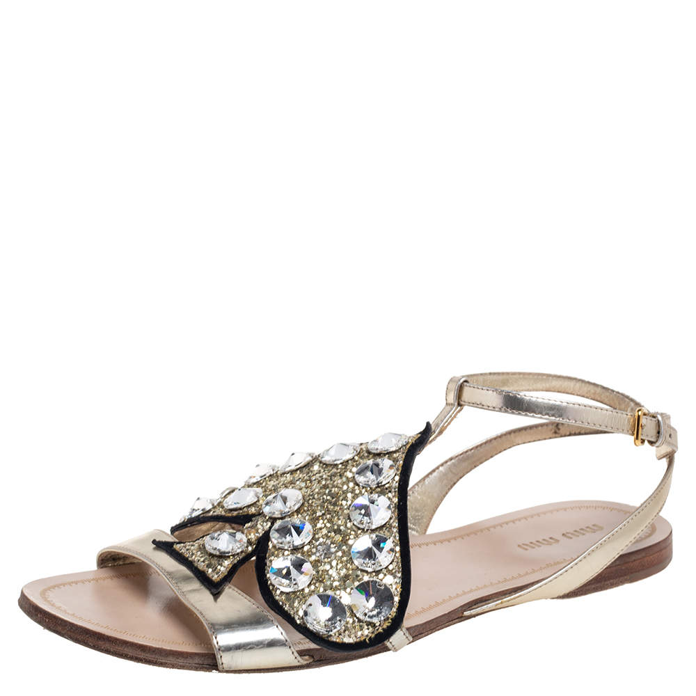 Pre Owned حذاء فلات ميو ميو جلد ميتاليك ذهبي مزين قلب غليتر مقاس 38