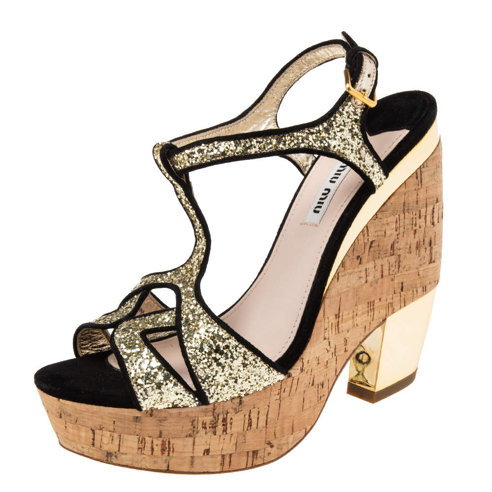 مملوكة مسبقًا Miu Miu Gold/Black Glitter and Suede Trim Cork Wedge Sandals Size 38.5