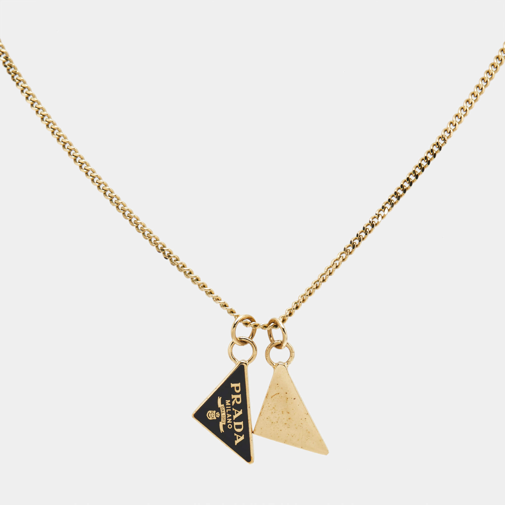 Pre Owned Prada Symbole Enameled Metal Triangle Gold Tone  Pendant Necklace