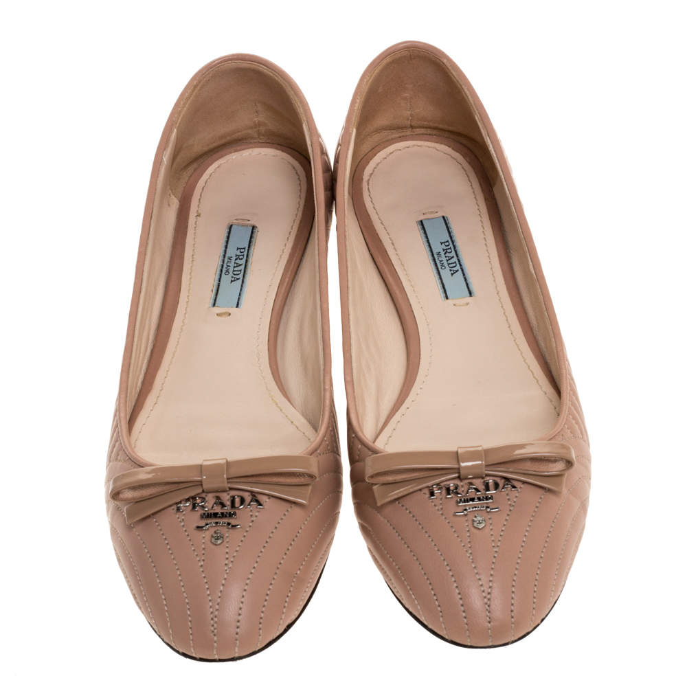 nude prada flats