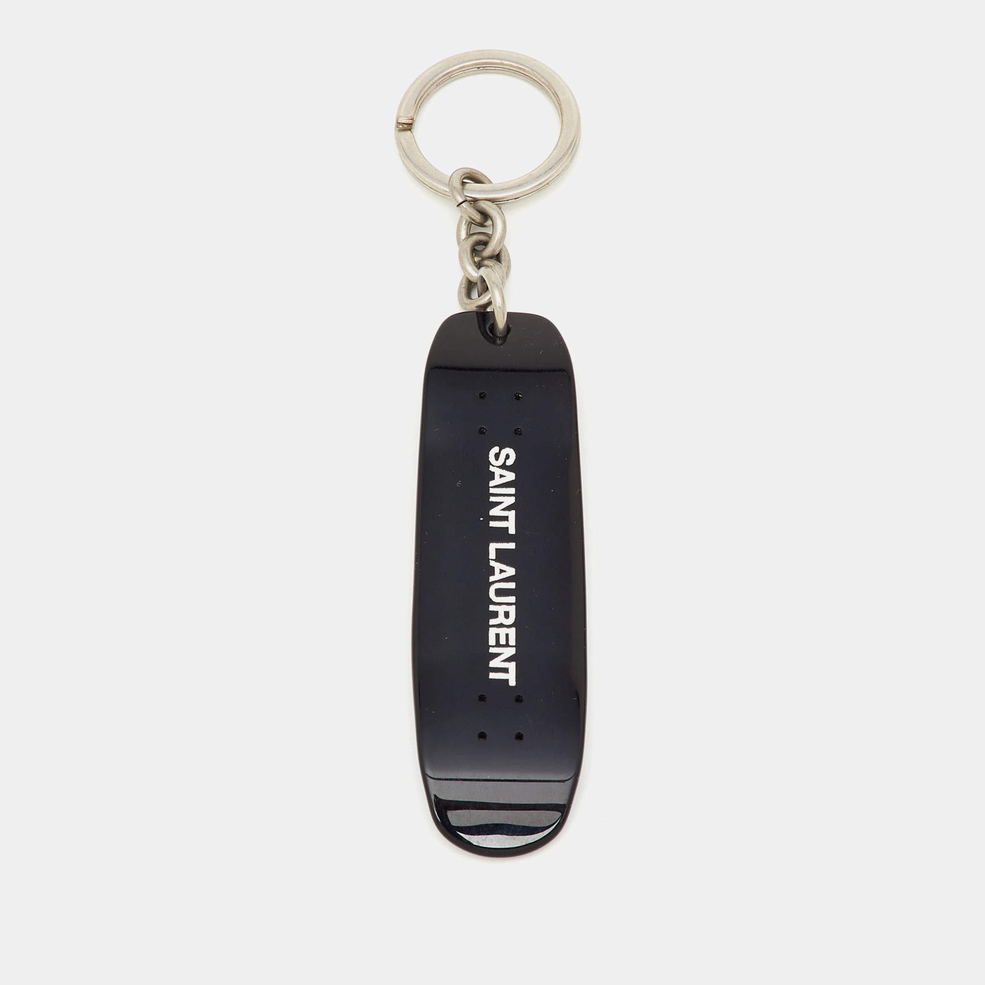 Pre Owned Saint Laurent Black Skateboard Motif Silver Tone Keyring