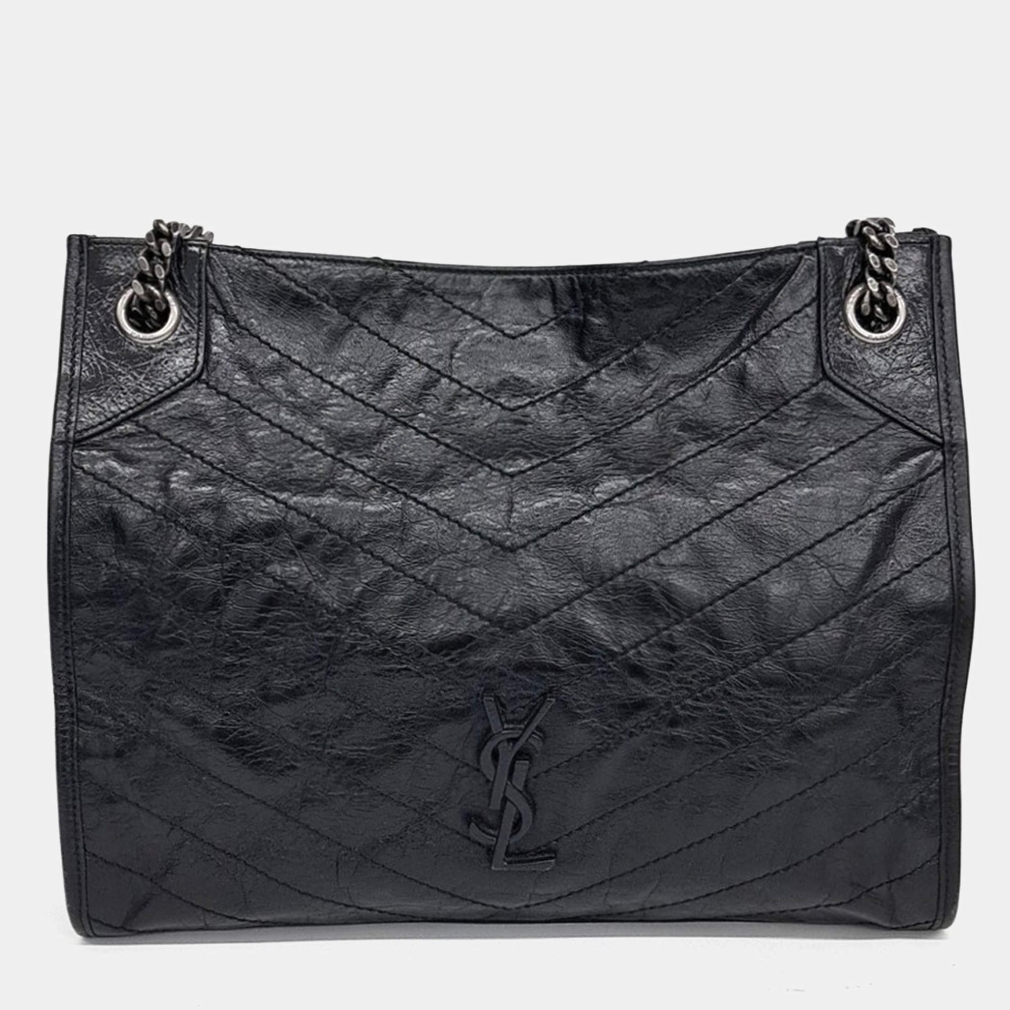 مملوكة مسبقًا حقيبة تسوق سان لوران باريس نيكي جلد أسود متوسطة الحجم