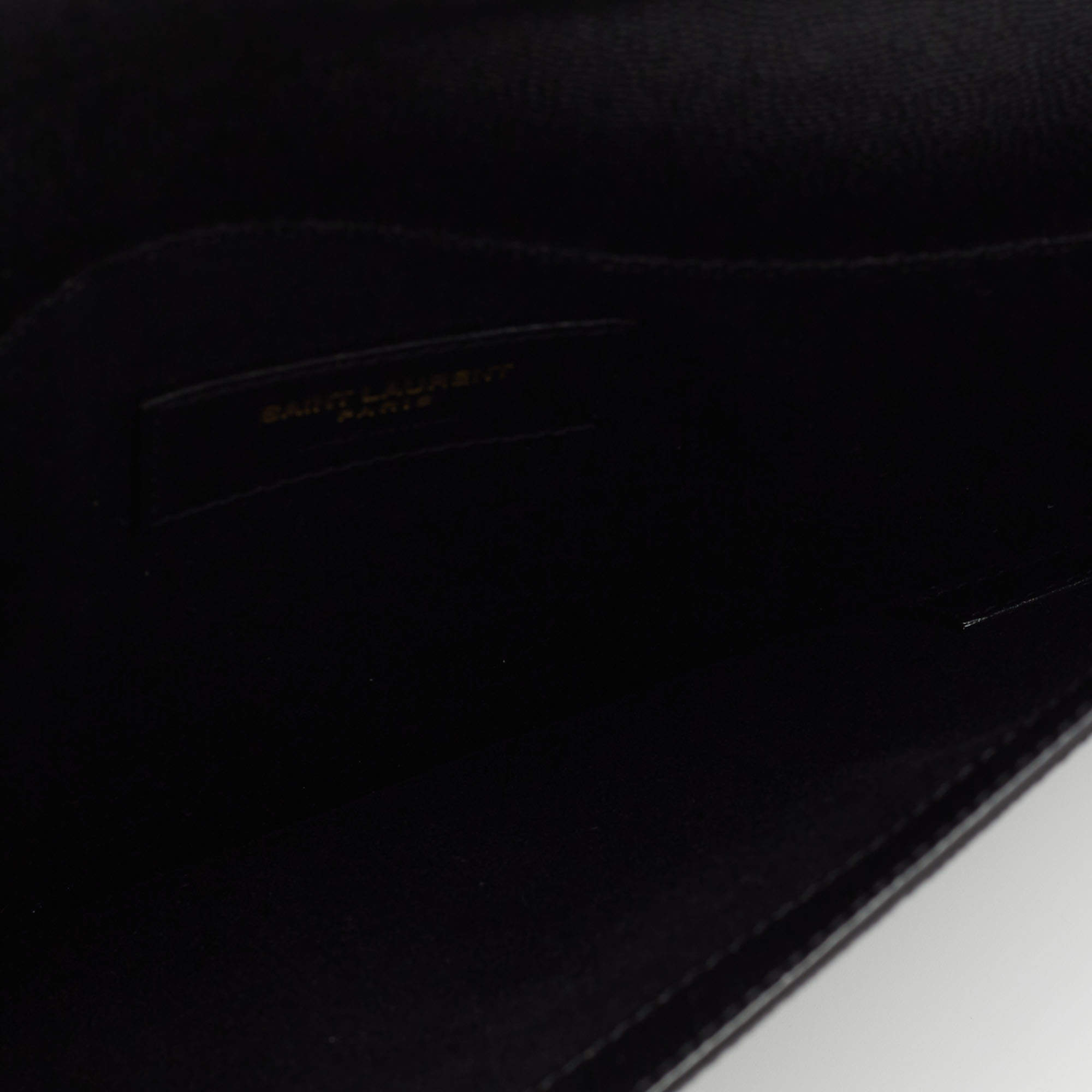 مملوكة مسبقًا Saint Laurent Black Grained Leather Medium Uptown Clutch