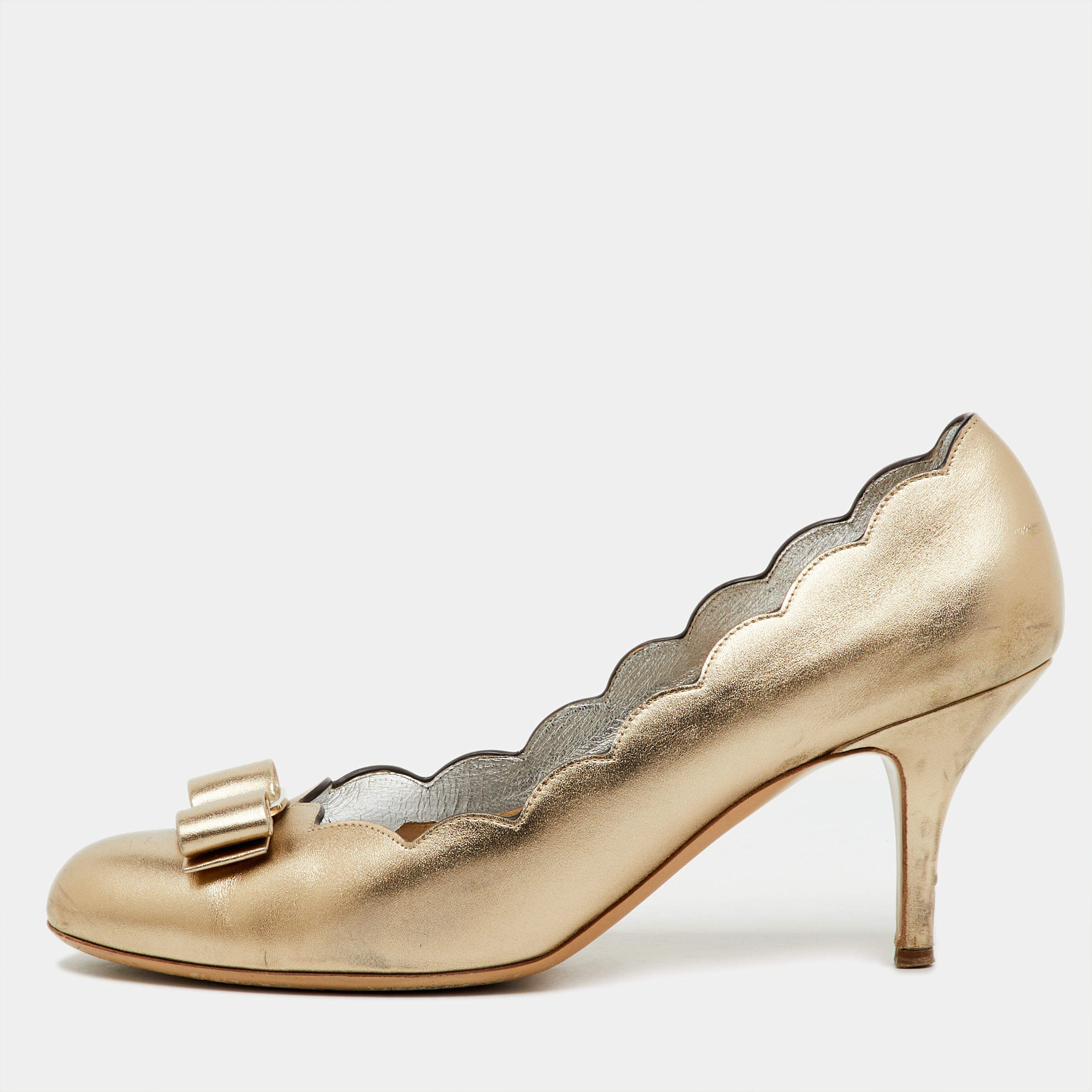 Pre Owned Salvatore Ferragamo Metallic Gold Leather Carla Vara Bow Pumps Size 40