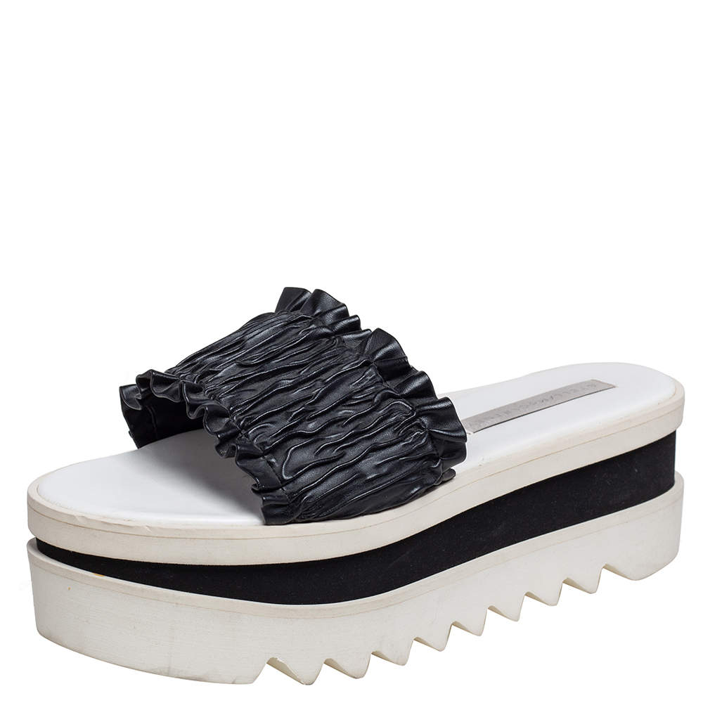 【送料&関税込】Stella McCartney Padded Faux Leather Slides Stella McCartney Padded Faux Leather Slides | italist