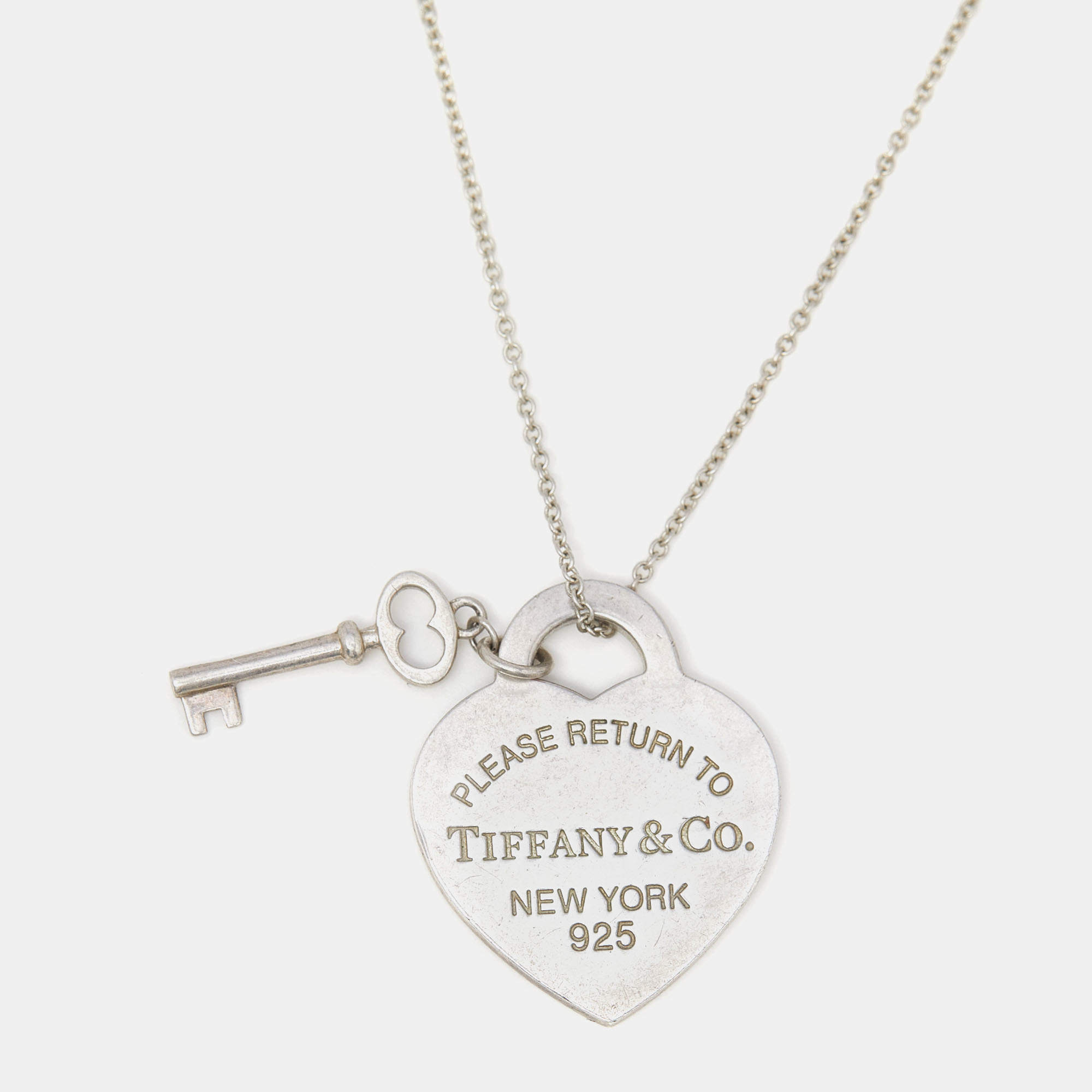 Pre Owned Tiffany & Co. Return To Tiffany Sterling Silver Heart Tag with Key Pendant Necklace