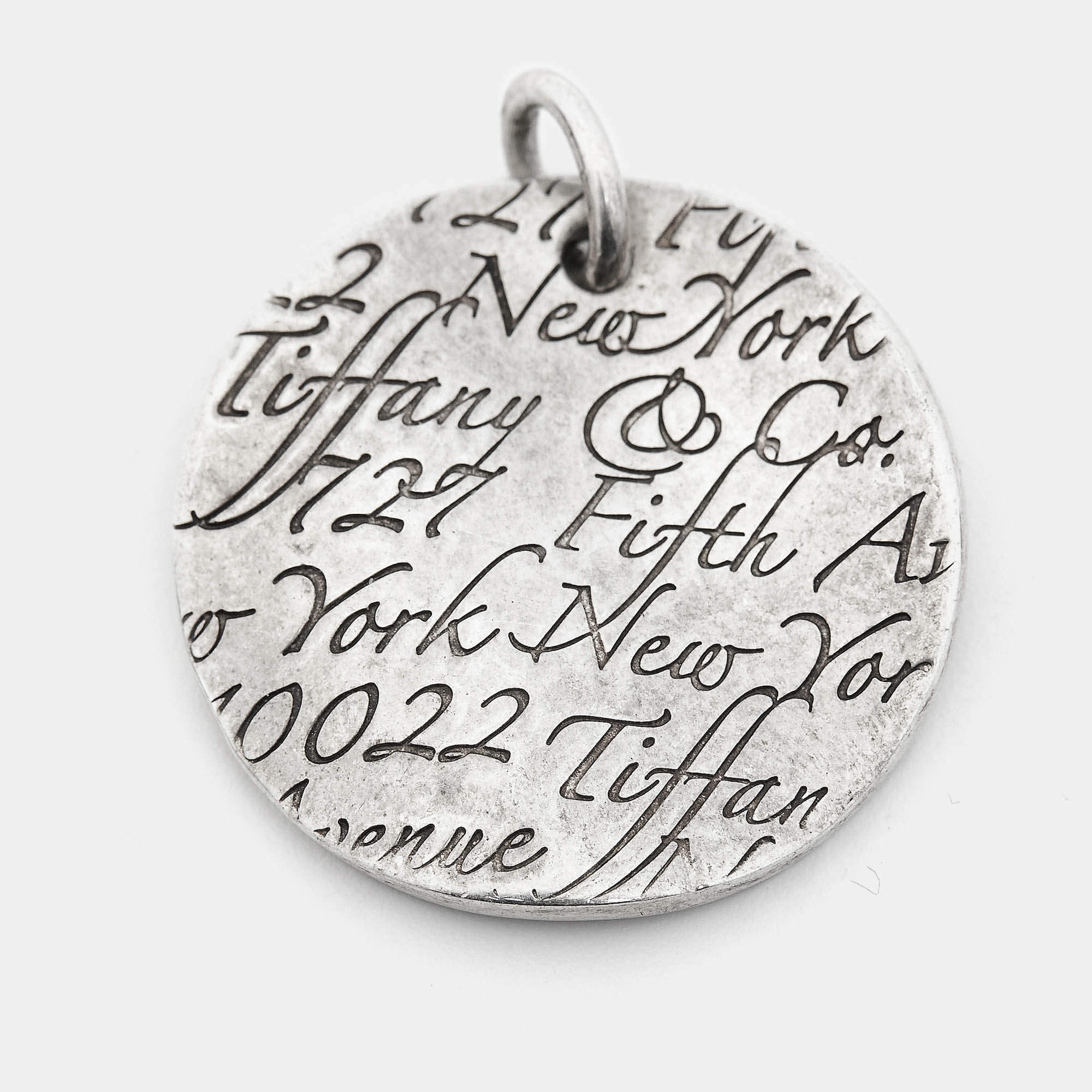 Tiffany & Co. Tiffany Notes Wavy Round Sterling Silver Pendant 