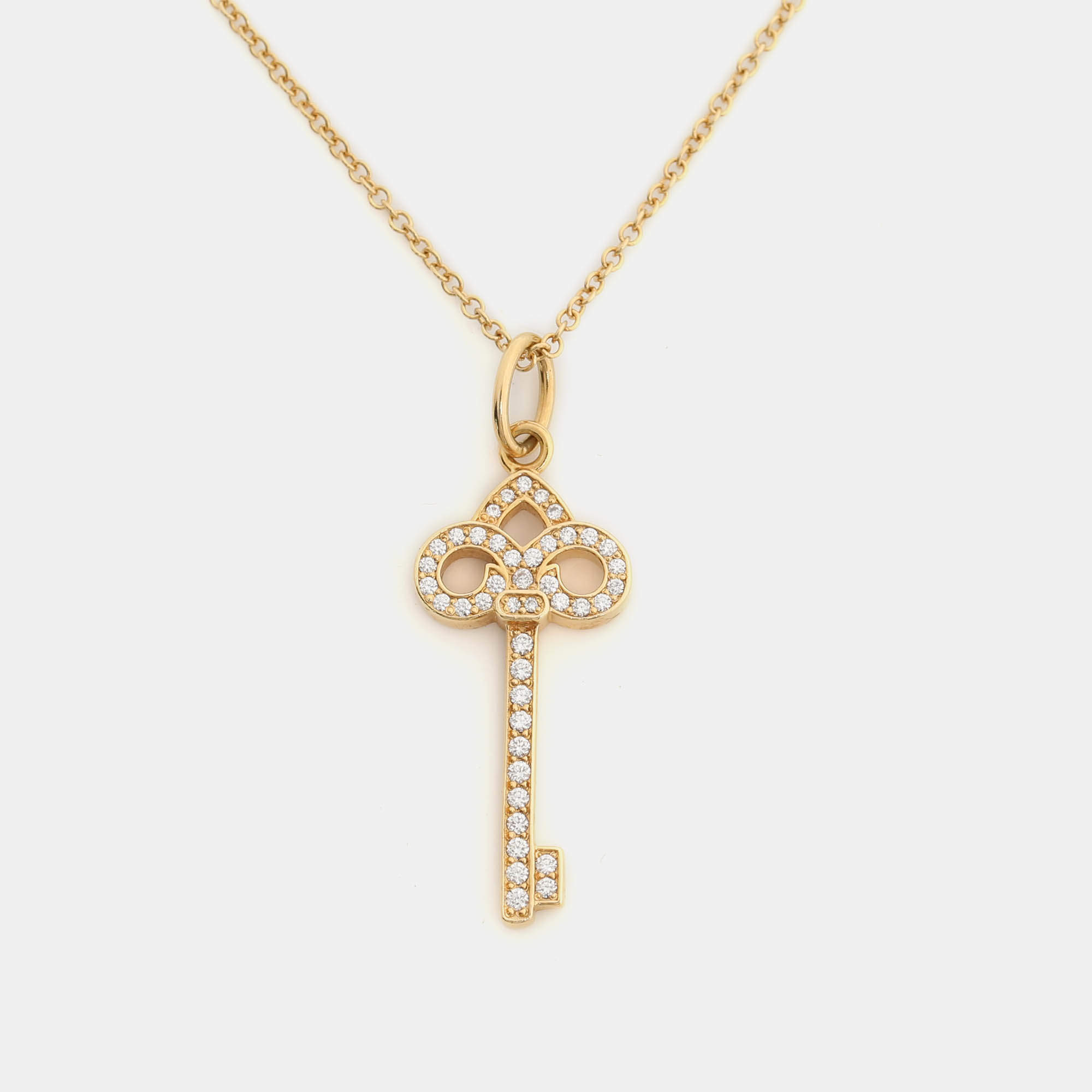 Tiffany & Co. Fleur de Lis Key Diamond 18k Gold Necklace