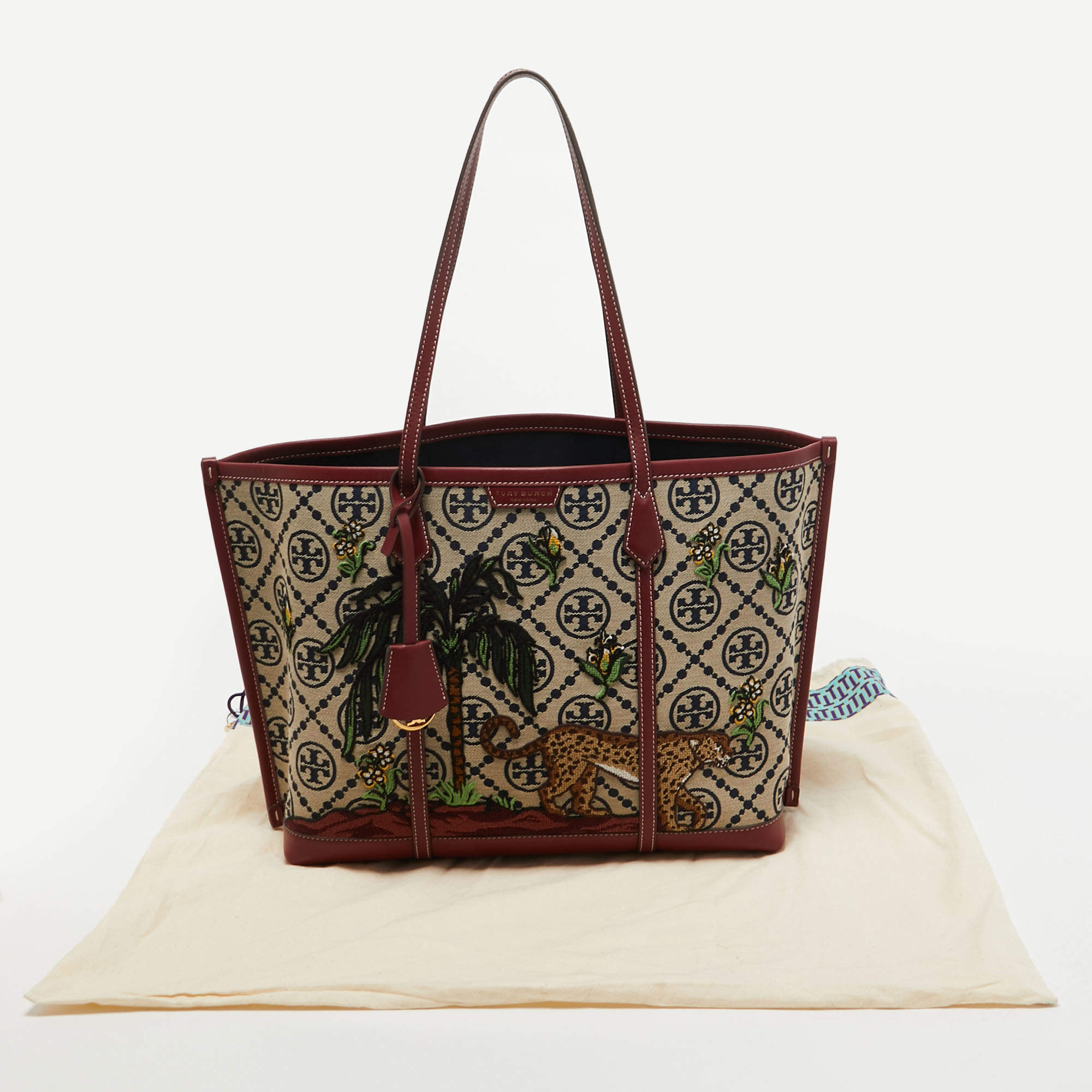 Tory Burch Burgundy Embroidered T Monogram Canvas and Leather Large Perry Tote  Tory Burch | TLC