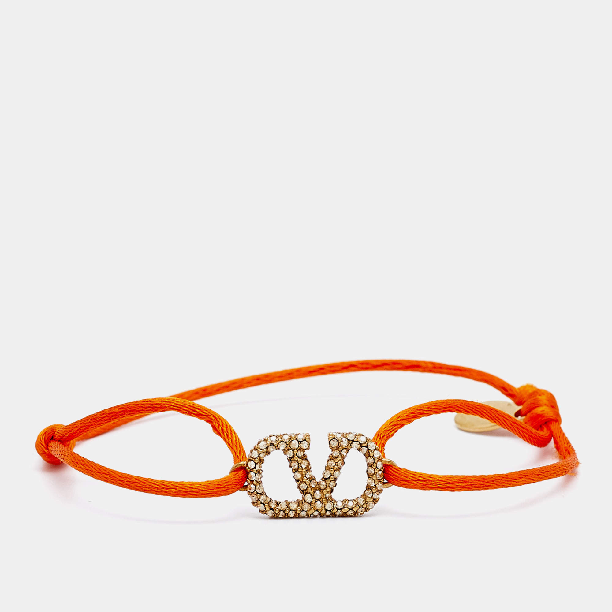 Pre Owned Valentino Vlogo Crystal Gold Tone Orange Cord Bracelet