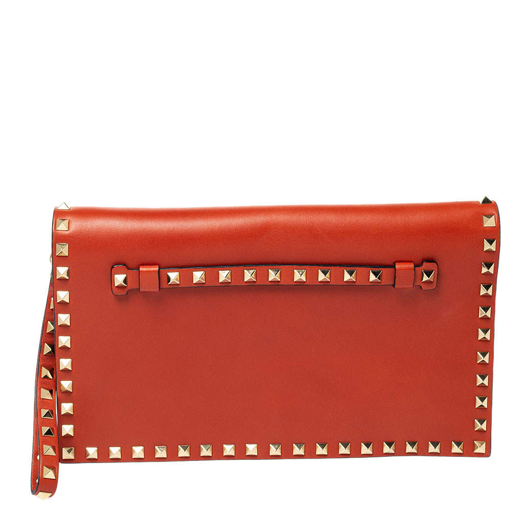 Pre Owned Valentino Orange Leather Rockstud Wristlet Clutch