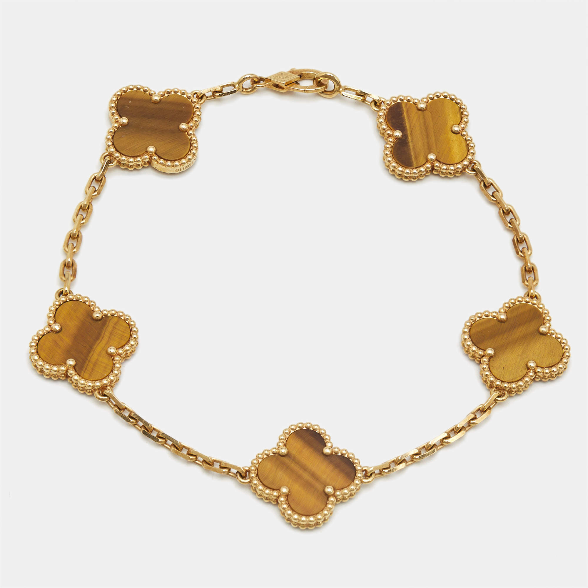 مملوكة مسبقًا Van Cleef & Arpels Vintage Alhambra Tiger's Eye 18k Yellow Gold 5 Motif Station Bracelet