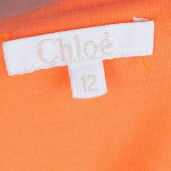 Pre Owned توب كلوي بكرانيش جيرسيه برتقالي نيون 12 سنة