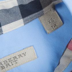 مملوكة مسبقًا قميص بربري قطن أزرق بأكمام طويلة وأزرار أمامية XS