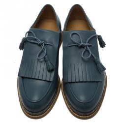 مملوكة مسبقًا Salvatore Ferragamo Teal Blue Leather Nikos Karung Trimmed Runway Fringe Loafers Size 42