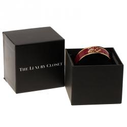 Pre Owned Carolina Herrera CH Logo Burgundy Enamel & Gold Tone Wide Bangle Bracelet 20 cm