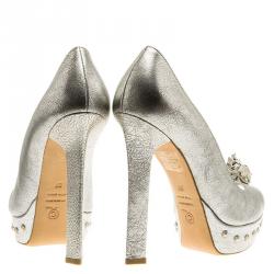 Pre Owned Alexander McQueen Metallic Silver Skull Embellished Peep Toe Platform Pumps Size 37