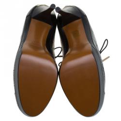 Pre Owned بوت للكاحل بربري جلد بروغي أسود برباط نعل سميك مقاس 40