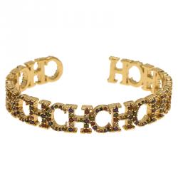 Pre Owned CH Carolina Herrera Logo Multicolored Crystals Gold Tone Cuff Bracelet