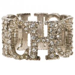 Pre Owned CH Carolina Herrera Crystal Studded Logo Silver Tone Ring Size 57