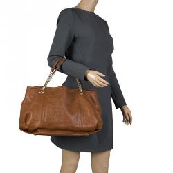 Pre Owned Carolina Herrera Brown Monogram Embossed Leather Dahlia Hobo