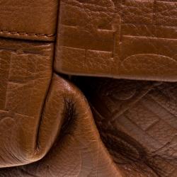 Pre Owned Carolina Herrera Brown Monogram Embossed Leather Dahlia Hobo