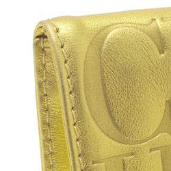 Pre Owned Carolina Herrera Gold Monogram Leather Tassel Clutch