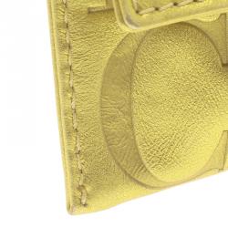 Pre Owned Carolina Herrera Gold Monogram Leather Tassel Clutch